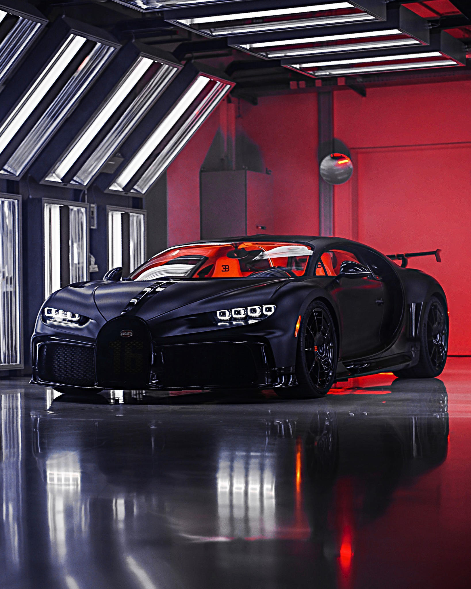 BUGATTI - Black carbon exterior meets a tangerine interior for this BUGATTI CHIRON Pur Sport