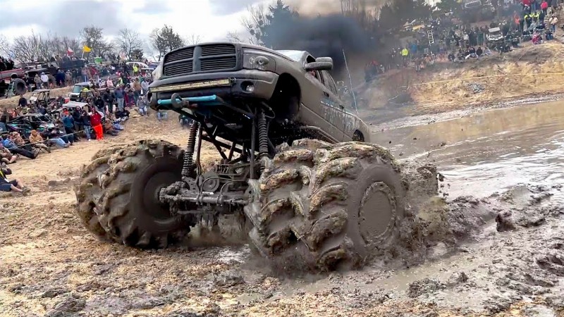 image 0 Mega Trucks Attempt Impossible Mud Pit