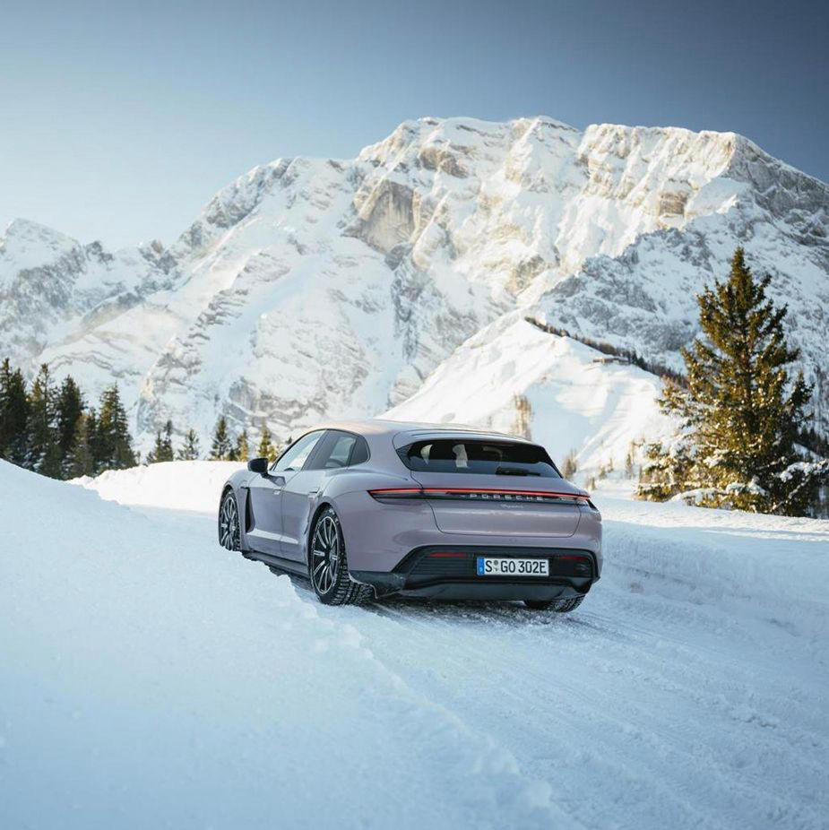 Porsche - Who needs a sleigh when you can Taycan your way past snow-capped mountains