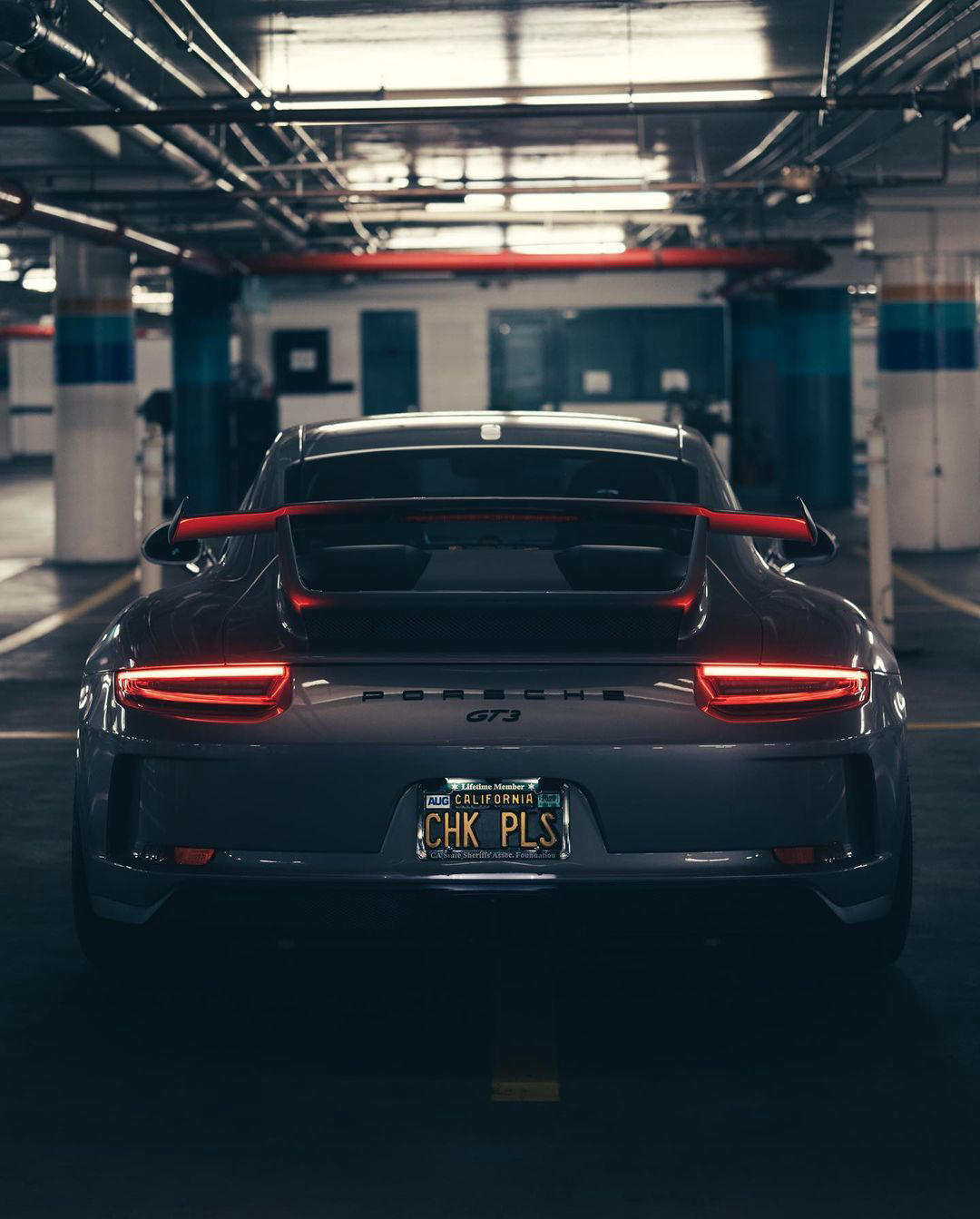 image  1 Porsche - Wings spread, eyes lit, muscles flexed – ready to roll into the night